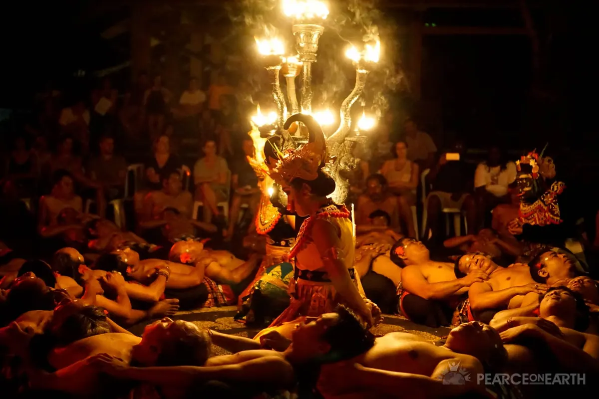 Golden statues glowing in warm lamplight, Bali