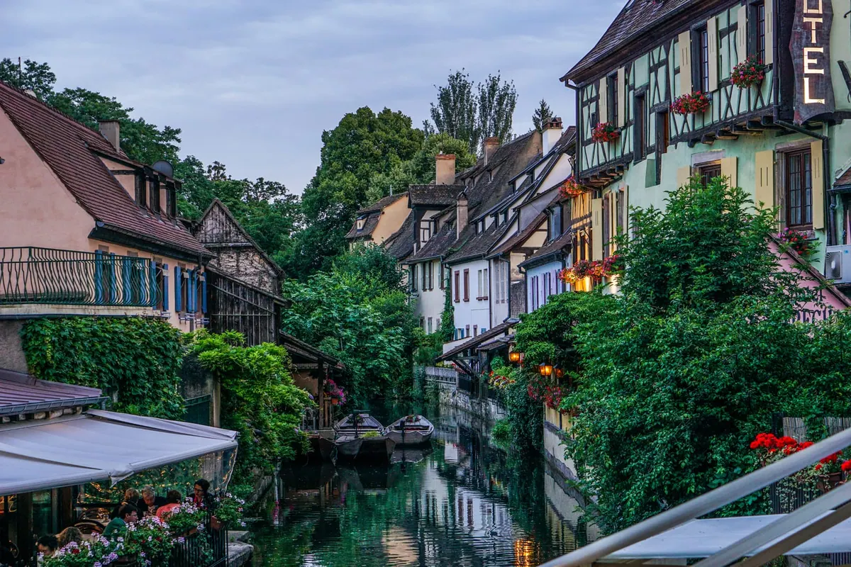 Half-timbered houses along a quiet canal in Colmar, France