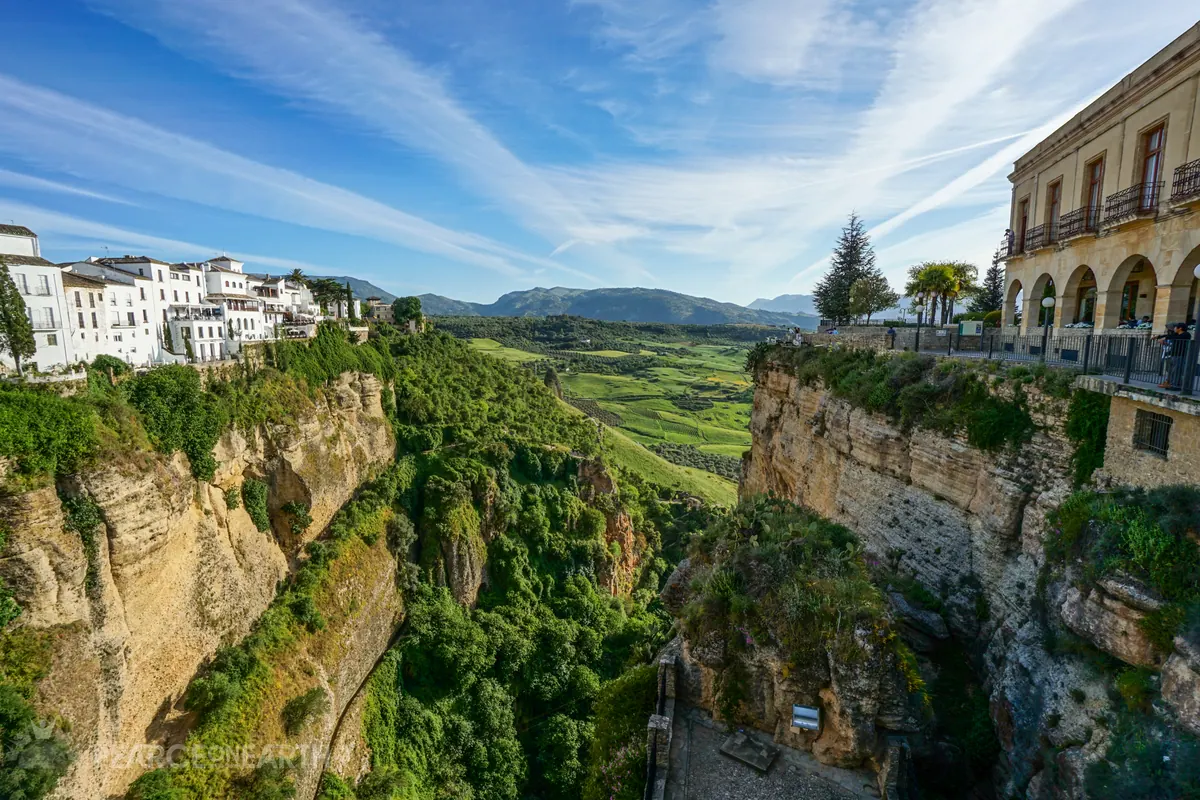 Whitewashed Ronda perched above its deep green gorge in southern Spain