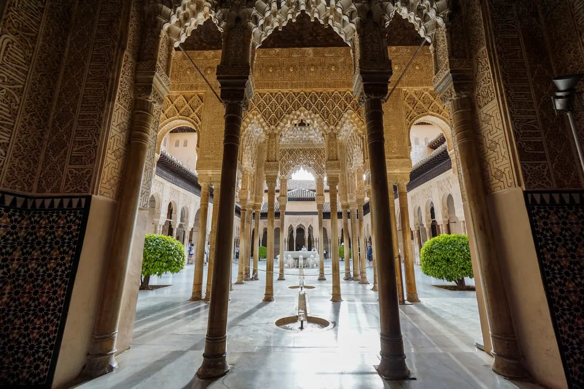 The symmetrical arches and fountain of the Alhambra, Granada, Spain